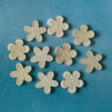 Pack of 10 natural Wooden Flower shapes with embossed pattern, & self adhesive pad