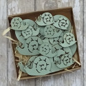 Box of 16pc Pale green wooden snail shapes, 8 small, 4 medium, 4 largel