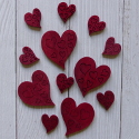 Pack of 12 ( 4 lge. 8 sm.)Wooden Heart Shapes with engraved detail red