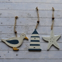 Set of 3 wooden Hanging shapes Seagull, Starfish, Lighthouse, as shown with string hanger & bead