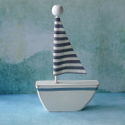 Wooden sailing Boat, as shown, with striped fabric sail, standing decoration