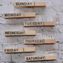 Set of 7 Wooden Pegs, with printed days of the week